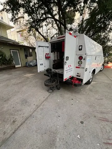 Magnet Plumbing service vehicle on-site for Grease Trap Cleaning in Sunset